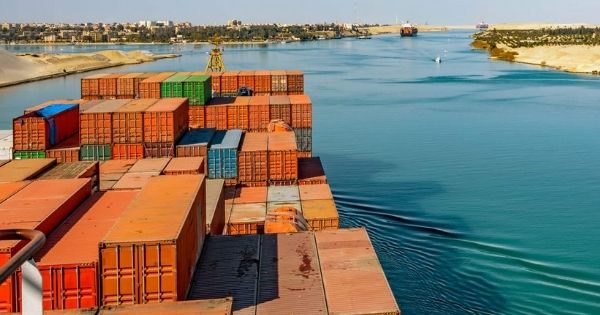 Container ships pass through the Suez Canal